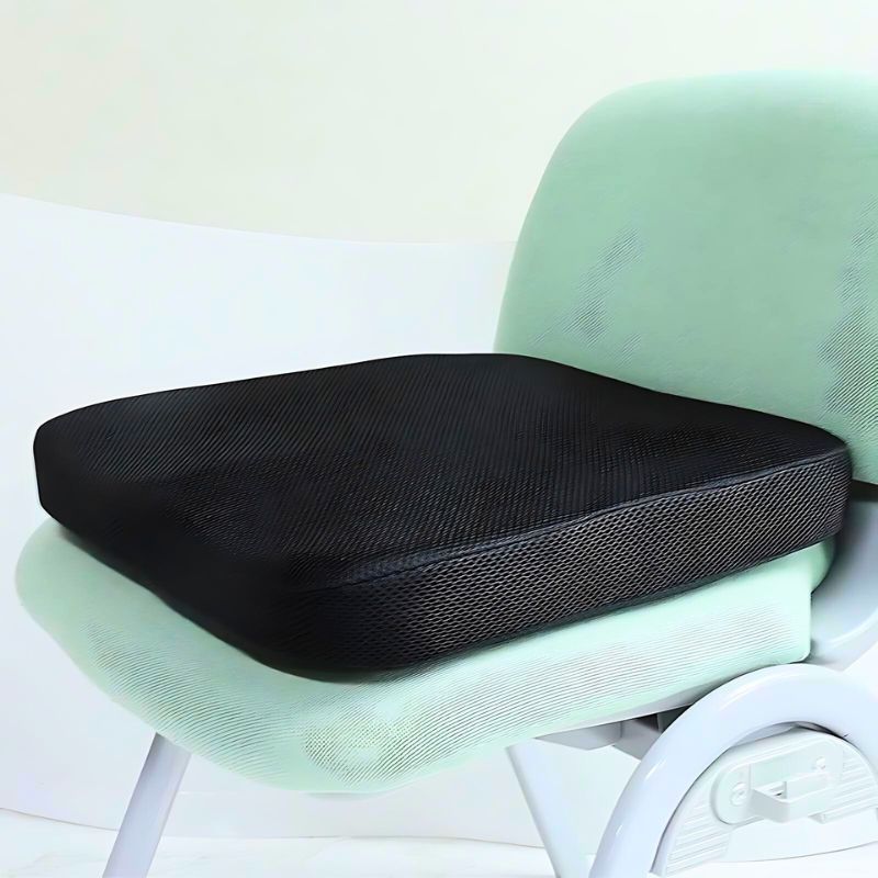 Image d'un coussin chaise ergonomique noir améliorant la posture