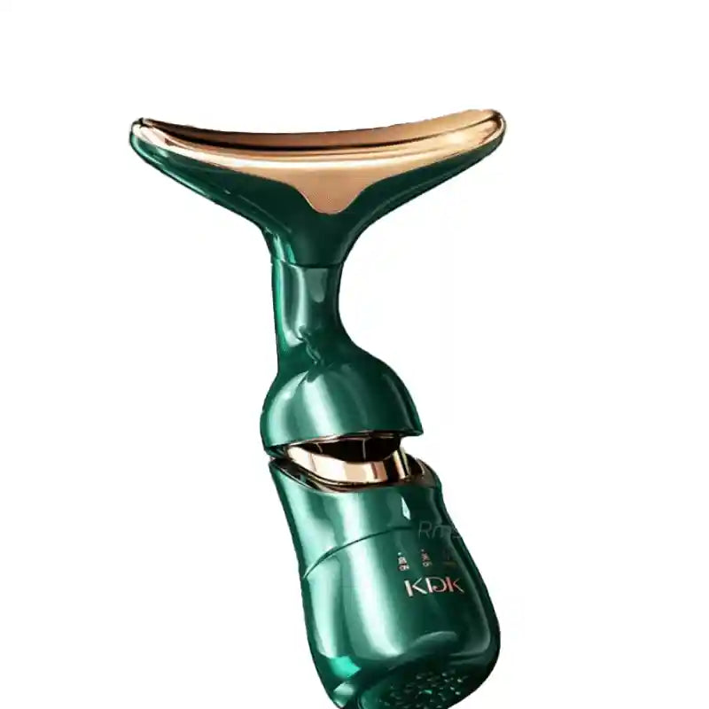  Appareil de lifting pour le visage et le cou DermaLift™ en vert émeraude et or, avec sa tête de massage ergonomique.