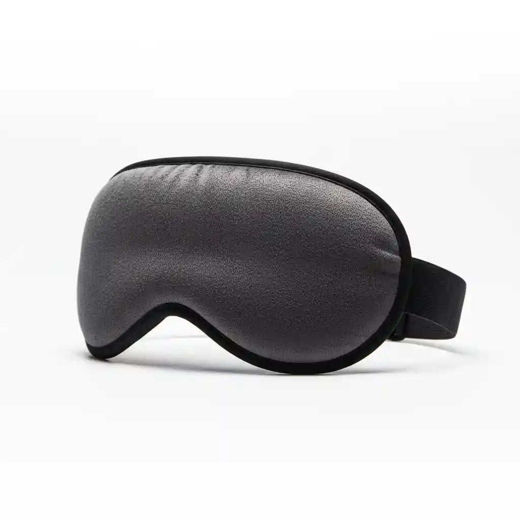 Masque chauffant pour les yeux OcuCalm™ de couleur grise, montrant sa conception ergonomique 3D.