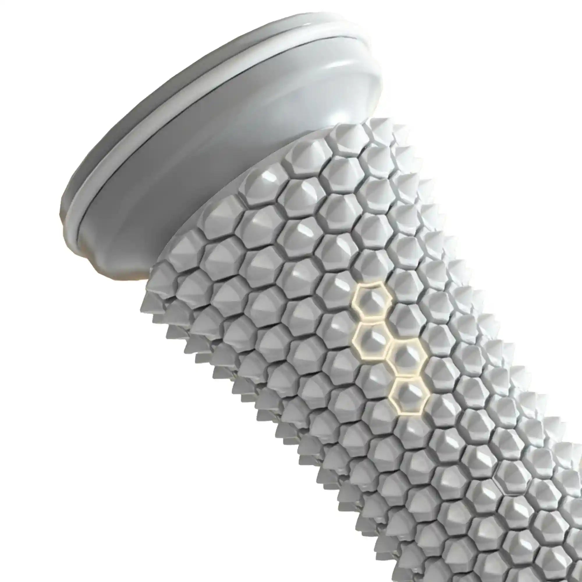 Gros plan sur les picots texturés du rouleau de massage AcuRoller™, conçus pour un massage myofascial ciblé.